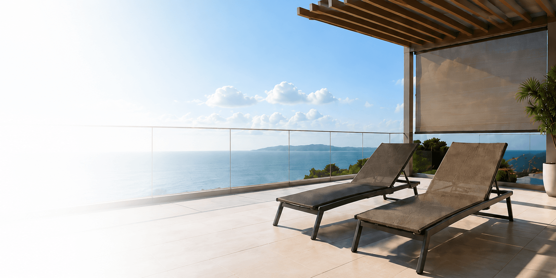 Mesh sun loungers on a coastal terrace with exterior shading